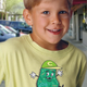 Jeremy Luchs, 9, wears the T-shirt he won as the sole youth participant in the Protozoan Parade.